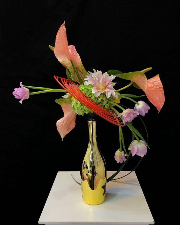 Intermediate floristry course, cascading bouquet with anthuriums, lilies, tulips and viburnum