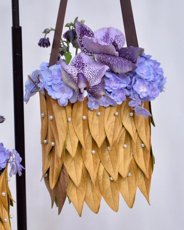 Intermediate floristry course, floral handbag with hydrangeas, vanda and aquilegia, featuring leafing technique