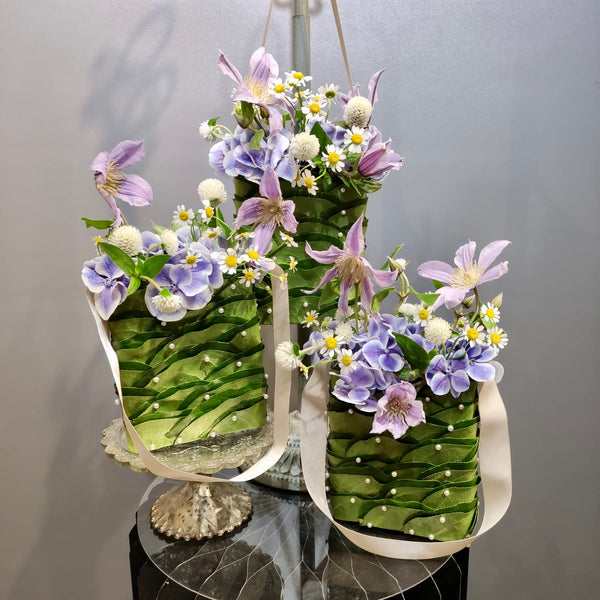 Intermediate floristry course, floral handbag with hydrangeas, matricaria, clematis and gomphrena, featuring leafing technique