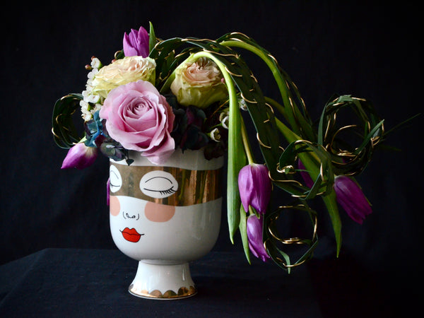 Intermediate floristry course, flower arrangement with hydrangeas, roses and tulips, featuring leaf manipulation technique