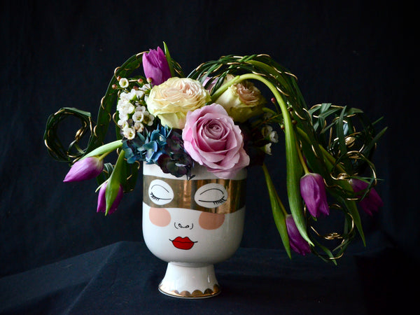 Intermediate floristry course, flower arrangement with hydrangeas, roses and tulips, featuring leaf manipulation technique