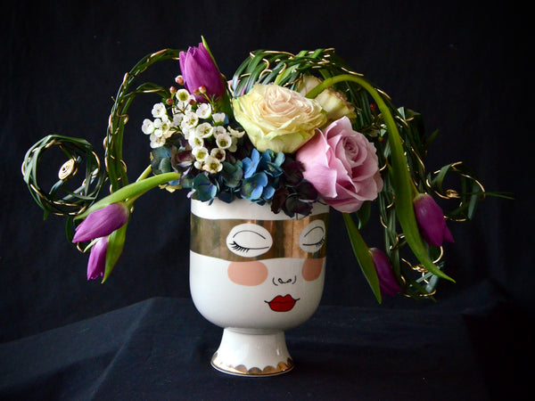 Intermediate floristry course, flower arrangement with hydrangeas, roses and tulips, featuring leaf manipulation technique