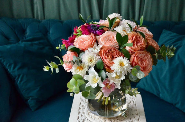 Intermediate floristry course, hand tied bouquet with roses, dahlias, tulips, and anemone
