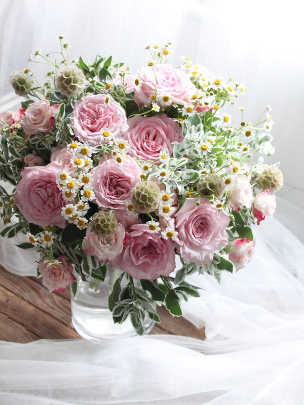 one day taster workshop, hand tied bouquet with garden roses, scabiosa pods and matricaria