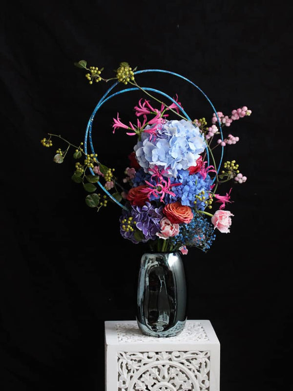 Hand-tied Bouquet Workshop, hand tied arrangement with hydrangeas, roses, tulips, nerine, gypsophila and symphoricarpos