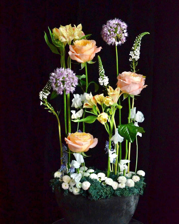Beginner floristry course, parallel design with roses, alstroemeria, allium, veronica, lathyrus and spray chrysanthemums