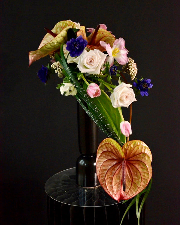 Certified Floral Designer Course, cascading design with anthuriums, tulips, featuring leaf manipulation technique