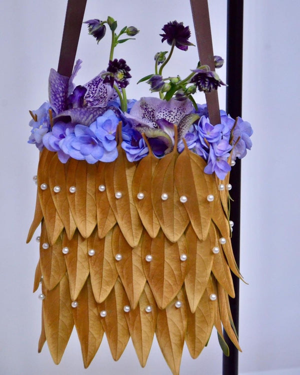 Intermediate floristry course, floral handbag with hydrangeas, vanda and aquilegia, featuring leafing technique