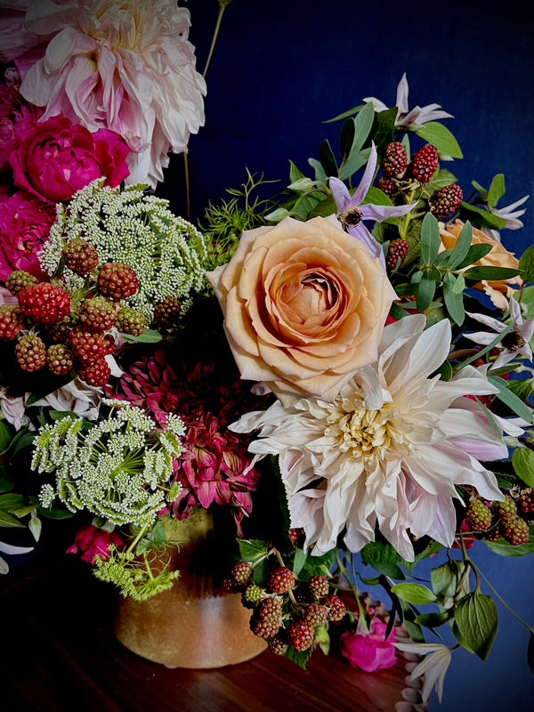 one day taster floristry workshop, still life arrangement with dahlias, chrysanthemums, roses, clematis, rubus and daucus carota