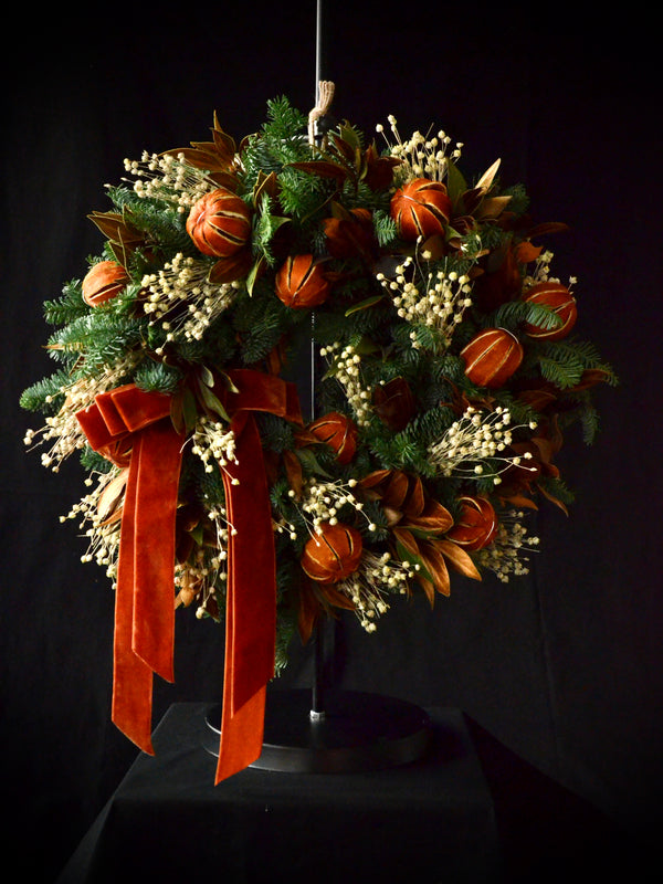 seasonal wreath workshop, christmas wreath with oranges and golden foliage